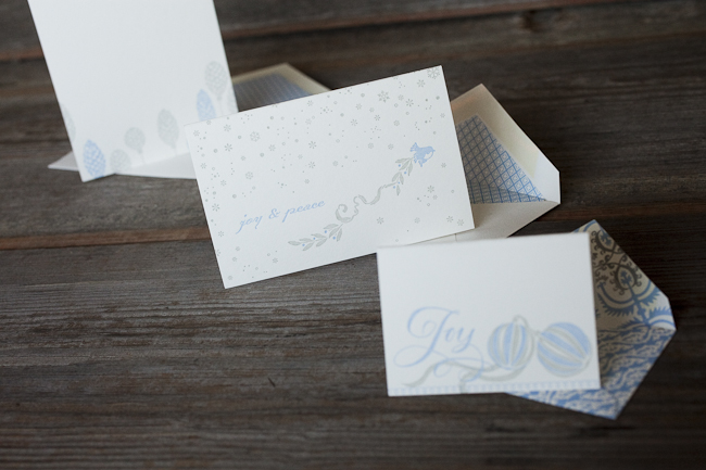 Elegant letterpress holiday cards from Smock Blue & silver inks and elegant holiday ornaments and motifs make these letterpress holiday cards extra pretty.