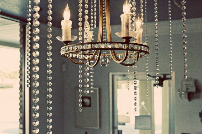UrbanCoast-shop1 An elegant chandelier hangs in the Urban coast Shop