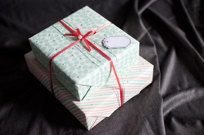 Our Seersucker wrap was used to create this picture-perfect present -- complete with ribbons and jewels for an extra-special look Double-sided gift wrap from Smock is perfect for stacked gifts -- alternate the different sides of the gift wrap to create a unique yet cohesive look